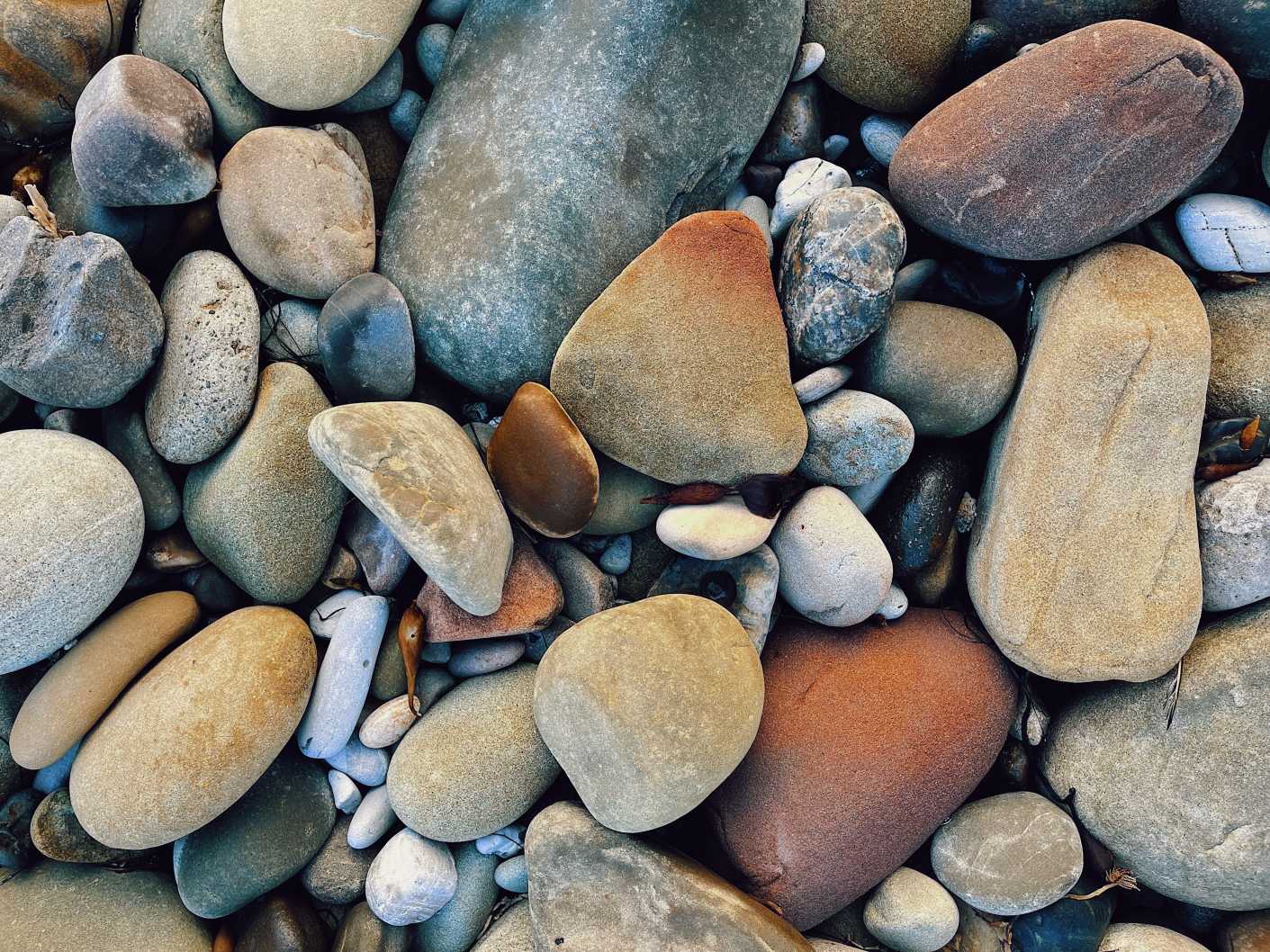 background of textured colored rocks and pebbles o 2025 01 08 19 12 27 utc 1 1