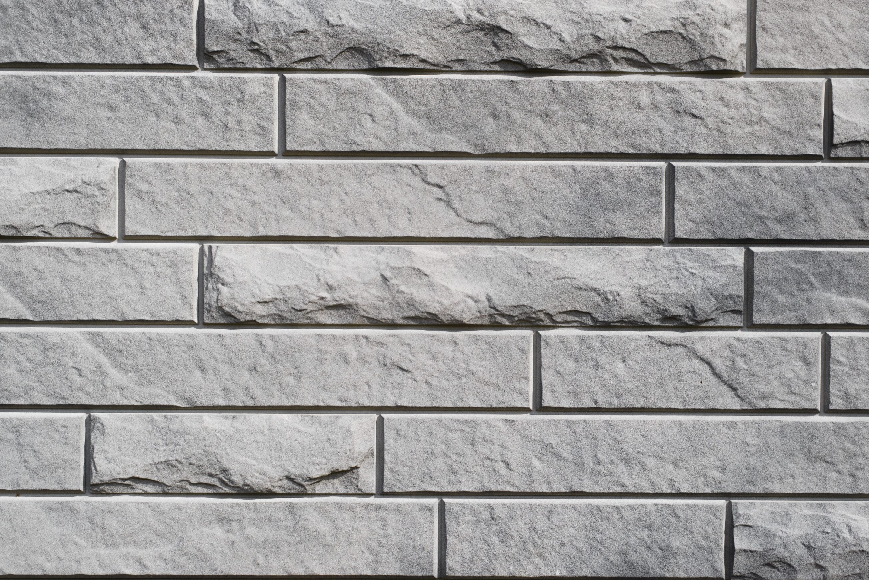 gray textured brick wall long and narrow horizont 2025 03 13 07 43 20 utc scaled