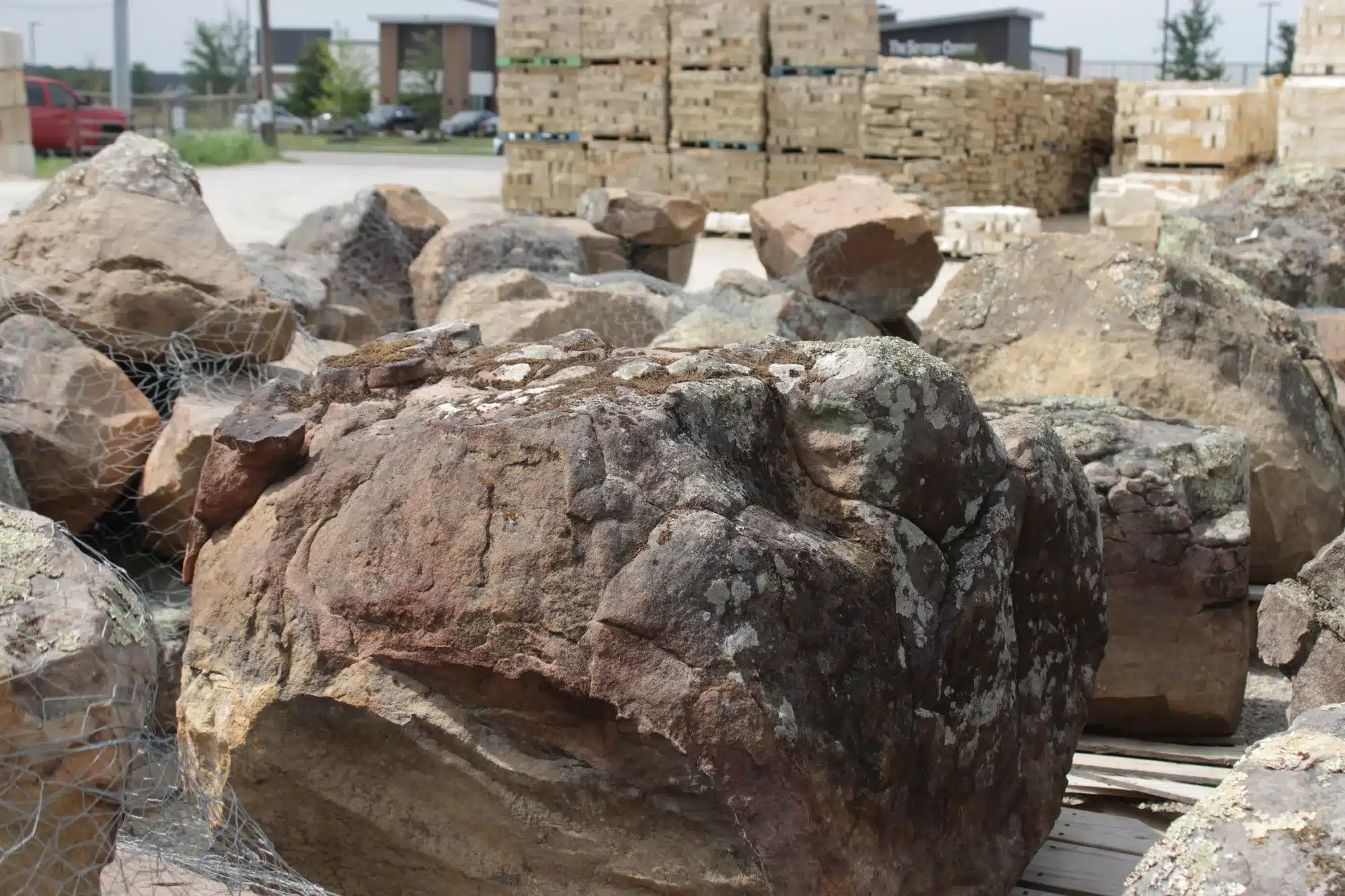 Moss rock pieces ready for landscaping projects in McKinney