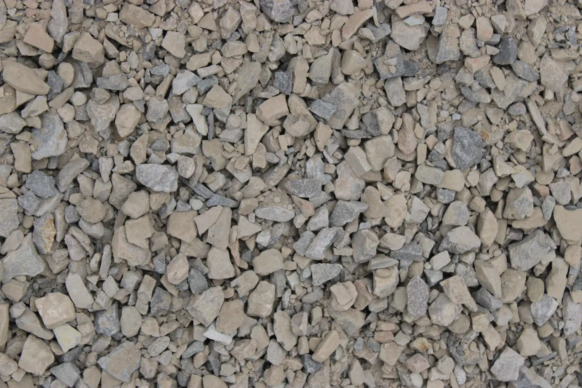 Road base 3/4 inch gravel pile showing angular rock and fines